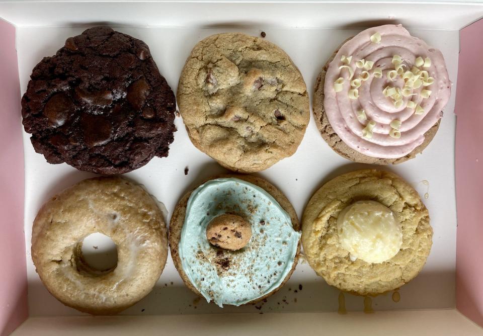 A variety of cookies and a doughnut are seen from Crumbl Cookies in March 2024, in Springfield.