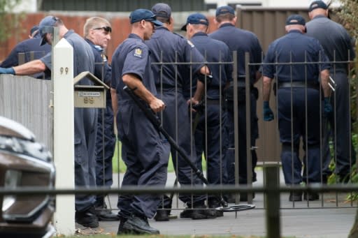 Police search a property next-door to the Masjid Al Noor mosque in Christchurch, New Zealand