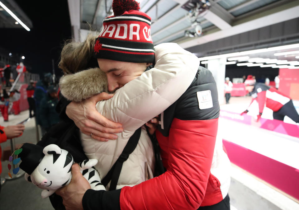 Janet Kopacz hugs her son Alexander Kopacz after he and Justin Kripps tie for the gold medal with a German sled in the two-man&nbsp;bobsled on&nbsp;Feb.&nbsp;19.