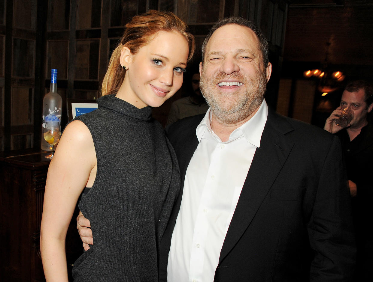 Jennifer Lawrence, pictured with Harvey Weinstein at a party for <em>Silver Linings Playbook</em> in 2013, denies any intimate relationship with the disgraced producer. (Photo: David M. Benett/Getty Images)