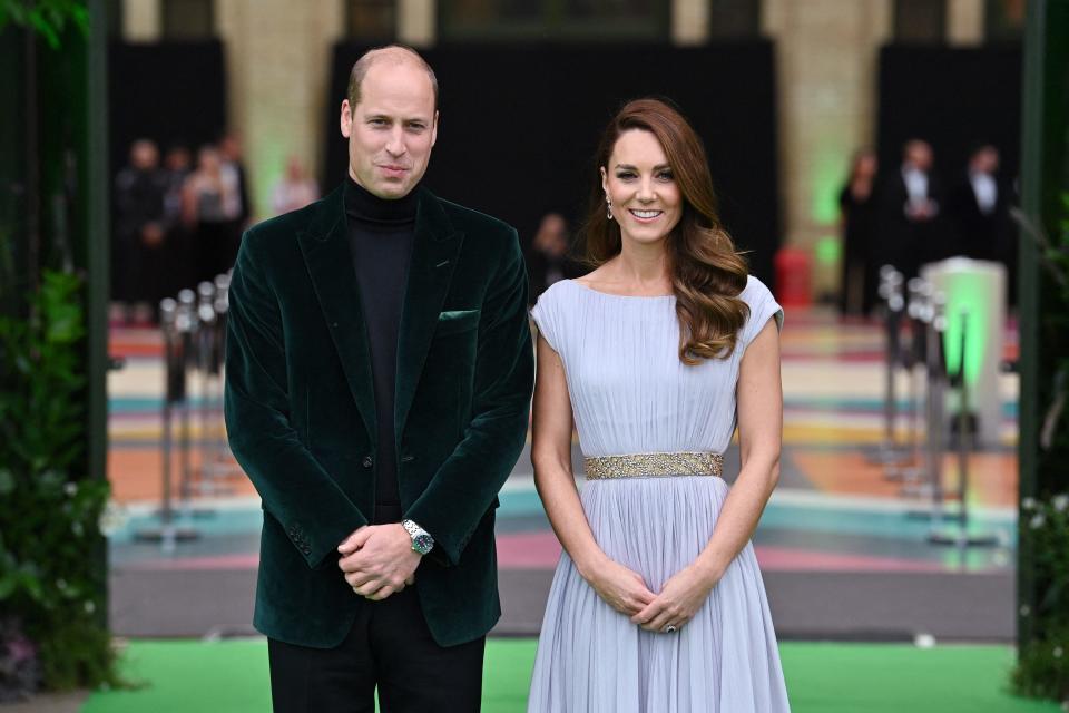 The Prince and Princess of Wales pose on the green carpet to attend the inaugural Earthshot Prize awards ceremony at Alexandra Palace