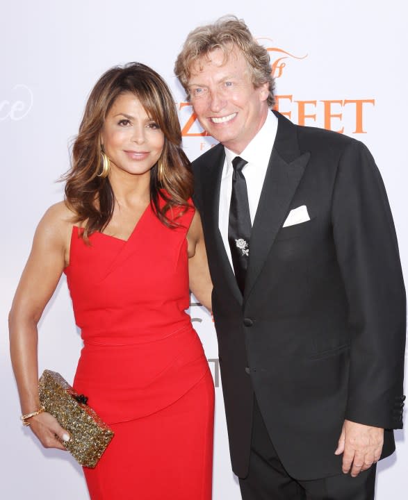 LOS ANGELES, CA – JULY 27: Paula Abdul (L) and Nigel Lythgoe arrive at the Dizzy Feet Foundation’s 3rd Annual Celebration of Dance Gala held at Dorothy Chandler Pavilion on July 27, 2013 in Los Angeles, California. (Photo by Michael Tran/FilmMagic)