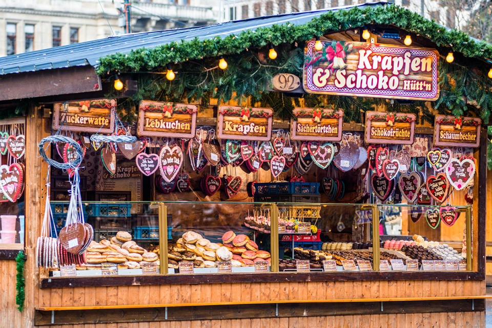 best christmas markets around the world, Heart-Shaped Gingerbread Cookies or Lebkuchen stall at Christmas market at Viennas Rathaus, Austria. (Photo by: Andrew Michael/Education Images/Universal Images Group via Getty Images)