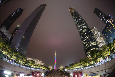 The Canton Tower (C), or Guangzhou TV Tower, is seen among skyscrapers in Guangzhou, Guangdong province, November 6, 2014. REUTERS/Alex Lee/File Photo