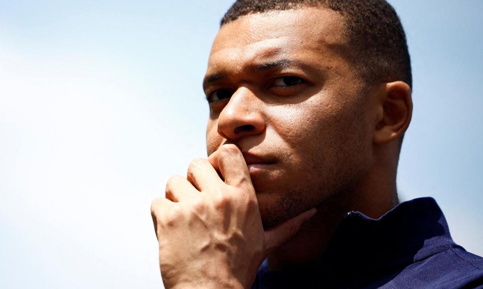 <span>Kylian Mbappé has taken a long and winding road to Madrid, where there is already a sense he belongs.</span><span>Photograph: Sarah Meyssonnier/AFP/Getty Images</span>