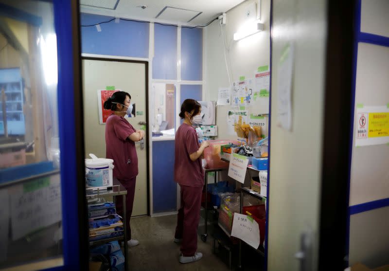 Medical workers work at the ICU for the coronavirus disease (COVID-19) patients at St. Marianna Medical University Hospital in Kawasaki, Japan