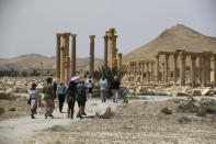 Tourists visit Roman ruins in Palmyra, Syria, Tuesday, May 11, 2023. Palmyra was captured by the Islamic Stae militants in 2015, who blew up some of the most iconic strictures. (AP Photo/Omar Sanadiki)