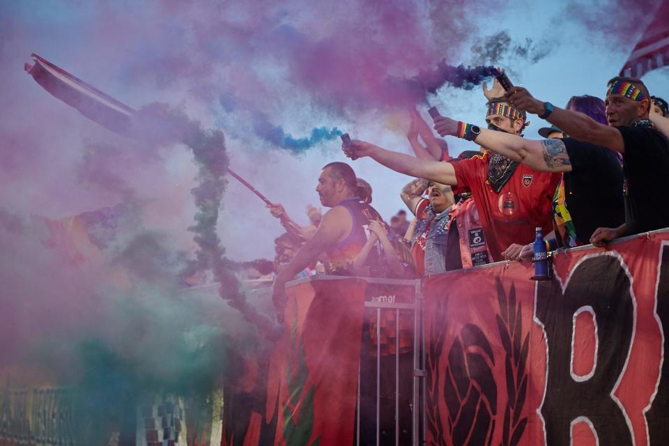 Jun 4, 2022; Chandler, AZ, USA; Phoenix Rising fans release rainbow smokes in support of the LGBTQ+ community at Phoenix Rising FC Stadium. Mandatory Credit: Alex Gould/The Republic