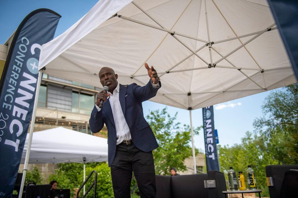 Former Denver Broncos running back and NFL Hall of Fame member Terrell Davis speaks at the 2022 Connect Conference at Encompass Technologies in Fort Collins on Thursday. Davis was on hand to promote his new CBD infused performance drink at the conference.