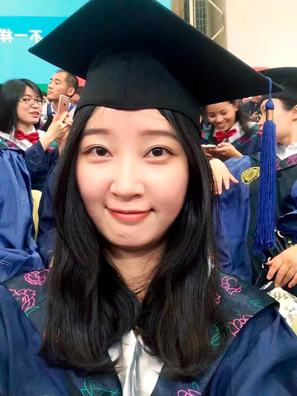 Yingying Zhang in a cap and gown at Peking University Shenzhen Graduate School before she was killed. (AP)