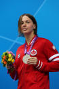 LONDON, ENGLAND - AUGUST 31: Silver medallist Brianna Nelson of Canada poses on the podium during the medal ceremony for the Women's 50m Butterfly - S7 Final on day 2 of the London 2012 Paralympic Games at Aquatics Centre on August 31, 2012 in London, England. (Photo by Clive Rose/Getty Images)