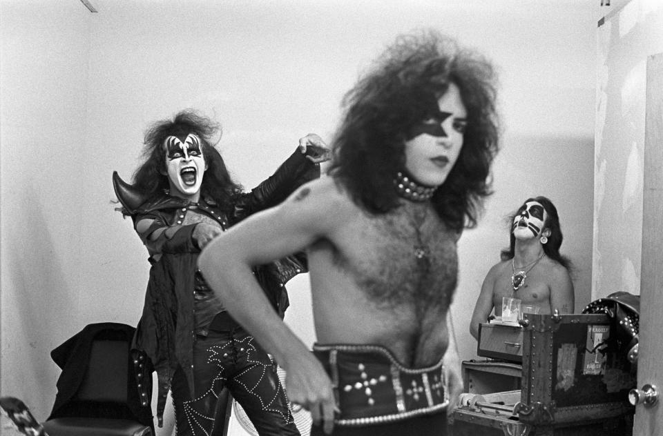 Gene Simmons of Kiss, practicing his moves while Paul Stanley gets ready, before performing  at Alex Cooley's Electric Ballroom. (Photo by Tom Hill/WireImage)