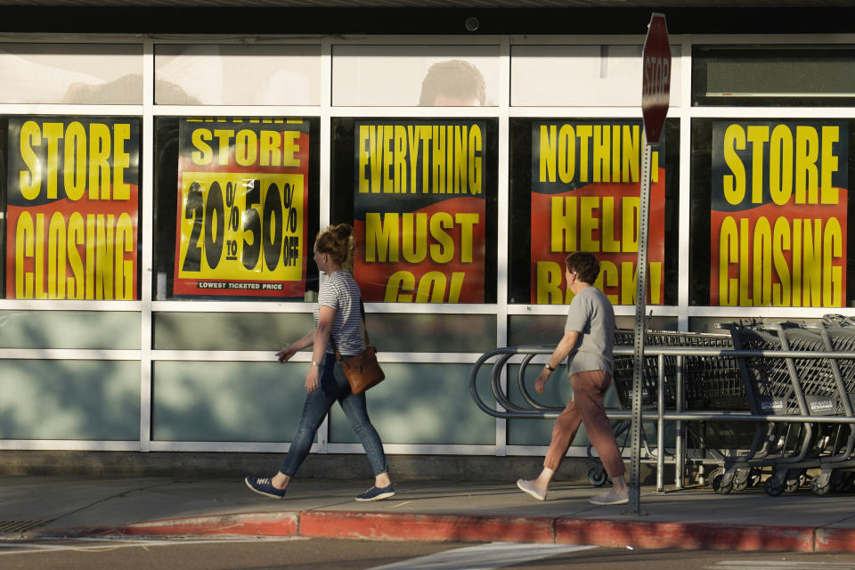 FILE - Shoppers enter exit a Bed Bath & Beyond store Monday, May 29, 2023, in Glendale, Colo. The big-box chain is staging store closing sales at its 360 locations after filing for bankruptcy in late April 2023. An Associated Press analysis found the number of publicly-traded “zombie” companies — those so laden with debt they're struggling to pay even the interest on their loans — has soared to nearly 7,000 around the world, including 2,000 in the United States. (AP Photo/David Zalubowski, File)