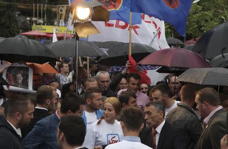 Supporters attend an election rally by the biggest opposition party Democratic League of Kosovo (LDK) in the western Kosovo town of Peja June 1, 2014. REUTERS/Hazir Reka