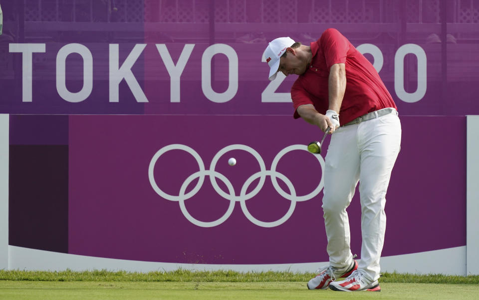 Austria's Sepp Straka hits a tee shot on the first hole during the first round of the men's golf event at the 2020 Summer Olympics on Wednesday, July 28, 2021, at the Kasumigaseki Country Club in Kawagoe, Japan. (AP Photo/Matt York)