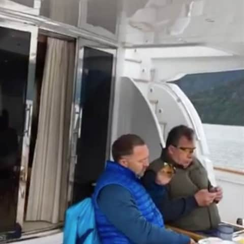 A still from Ms Vashukevich's video of Oleg Deripaska and Sergei Prikhodko discussing US relations on a yacht, which Instagram later removed - Credit: Instagram