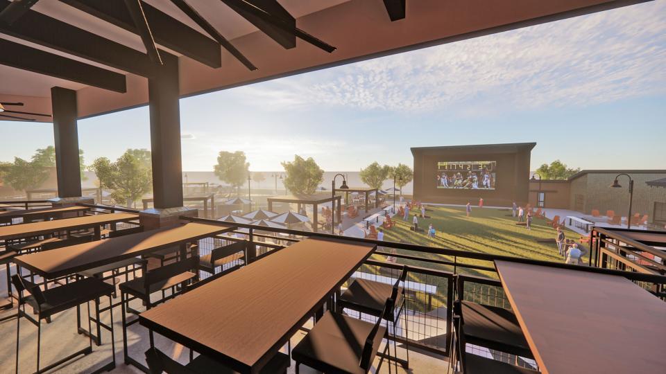 A 2022 photo rendering of the view from the patio at The Kitchen Grill and Games under construction at Discovery Park.