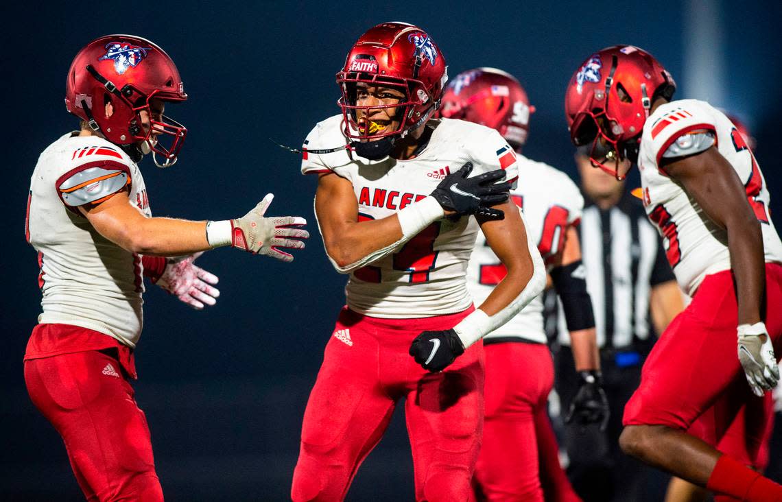 Kennedy Catholic tail back Xe’Ree Alexander (24) celebrates after making a tackle in the fourth quarter of a game at Auburn Memorial Stadium in Auburn, Wash. on Oct. 6, 2022. Kennedy Catholic defeated Auburn Riverside 47-17.