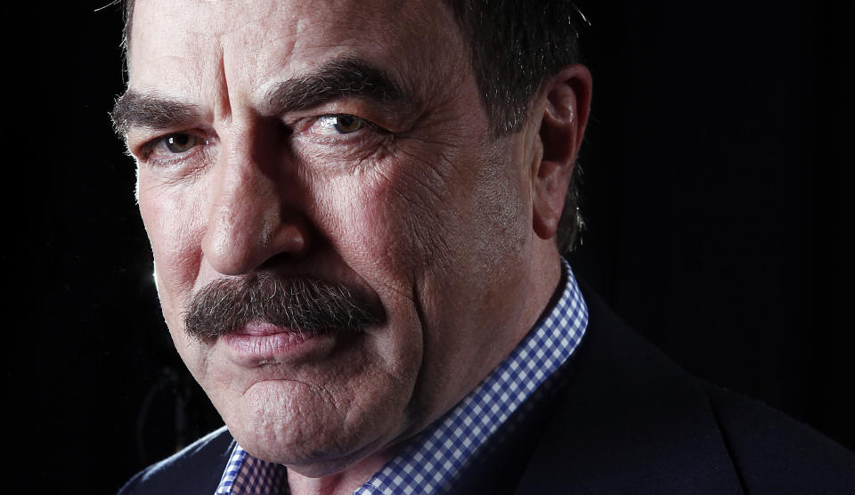 In this March 21, 2012 photo, actor Tom Selleck poses for a portrait in New York. On the CBS hit drama, "Blue Bloods," Selleck plays Frank Reagan, the NYPD Commissioner as well as the patriarch of a family devoted to law enforcement and one another. Selleck is also starring in "Jesse Stone: Benefit of the Doubt," airing on CBS on May 20. It's the eighth in the series of Jesse Stone TV whodunits that began in 2005, based on characters created by the late Robert B. Parker in his best-selling series of books. (AP Photo/Carlo Allegri)