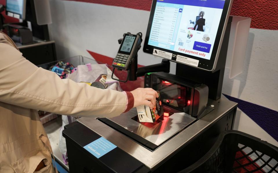 A customer uses a self checkout terminal - Christopher Furlong/Getty Images