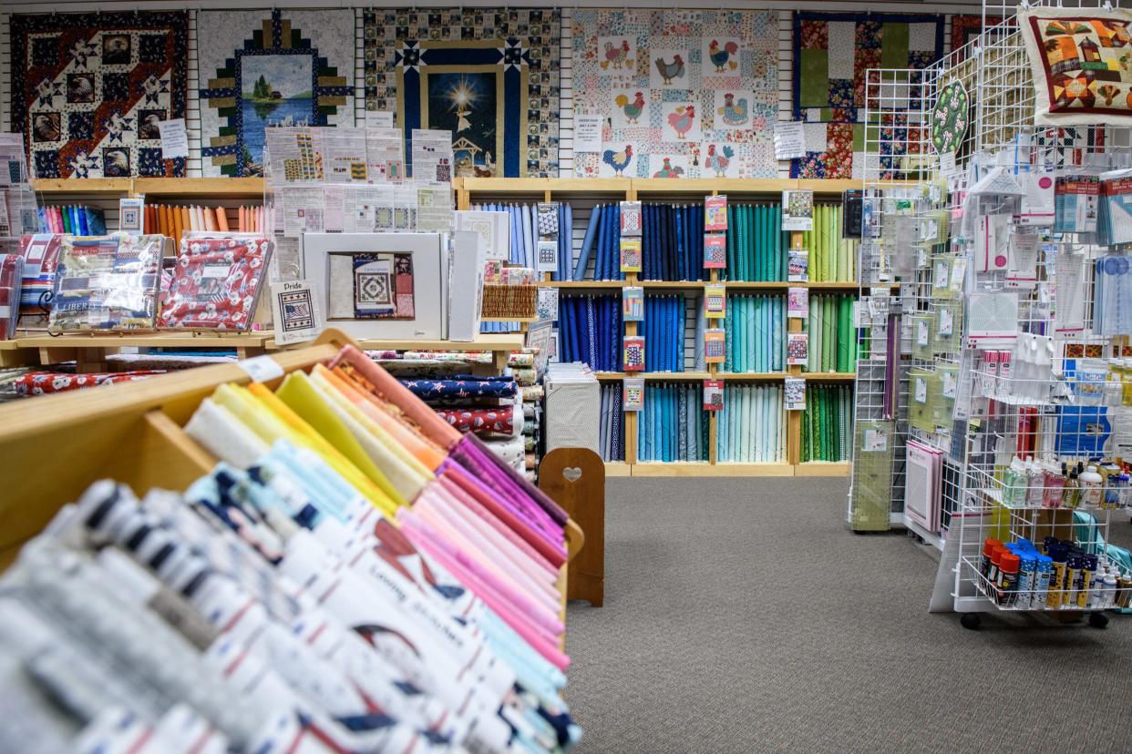 Loving Stitches quilt shop at 7076 Ramsey St. offers a wide selection of fabrics, sewing notions, and embroidery threads.