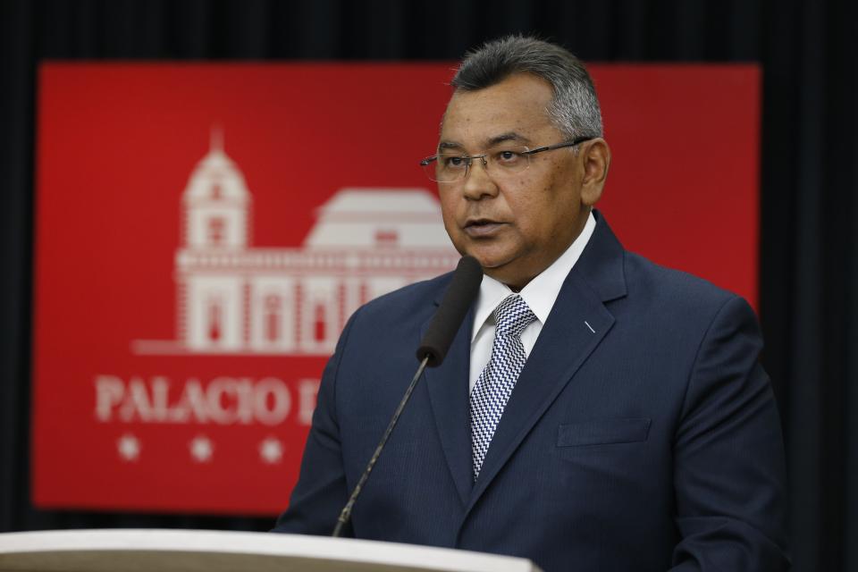 Minister of Internal Affairs, Justice and Peace, Nestor Reverol speaks during a press conference where he presented photos he said linked opposition leader and self-proclaimed President Juan Guaido with Colombian paramilitaries, in Caracas, Venezuela, Friday September 13 of 2019.The photos he presented were allegedly taken in February when Guaido crossed into Colombia and appeared at a concert held by billionaire Richard Branson. Guaido said he had photos taken with many people and has no way of knowing each individual's background. (AP Photo/Leonardo Fernandez)