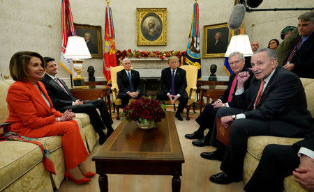 U.S. President Donald Trump and Vice President Mike Pence meet with House Democratic leader Nancy Pelosi, Speaker of the House Paul Ryan, Senate Majority Leader Mitch McConnell and Senate Minority Leader Chuck Schumer in the Oval Office of the White House in Washington, U.S., December 7, 2017. REUTERS/Kevin Lamarque