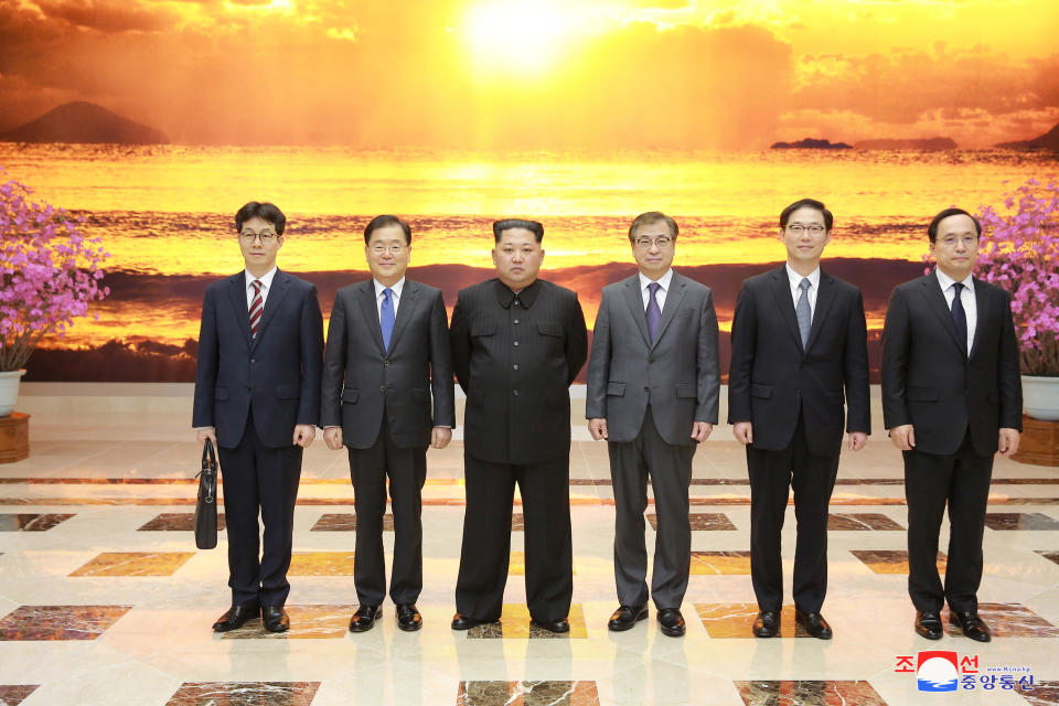 North Korean leader Kim Jong Un meets members of the special delegation.