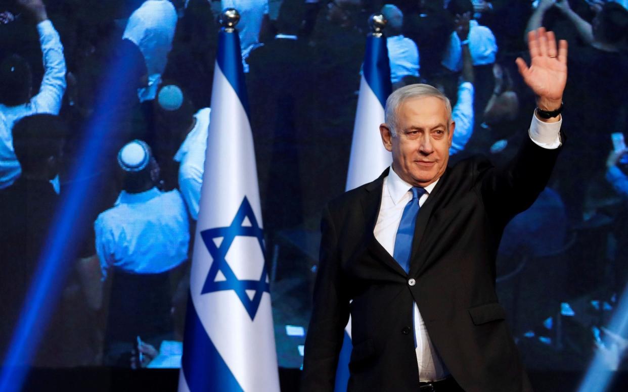 Israeli Prime Minister BenjaminÂ Netanyahu arrives at the Likud party headquarters in Tel Aviv - AMMAR AWAD /REUTERS