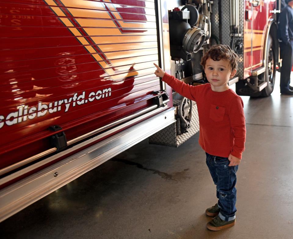 Mason Records looks at one of the fire trucks Tuesday, Nov. 14, 2023, at the Salisbury Fire Department Station 2 in Salisbury, Maryland.