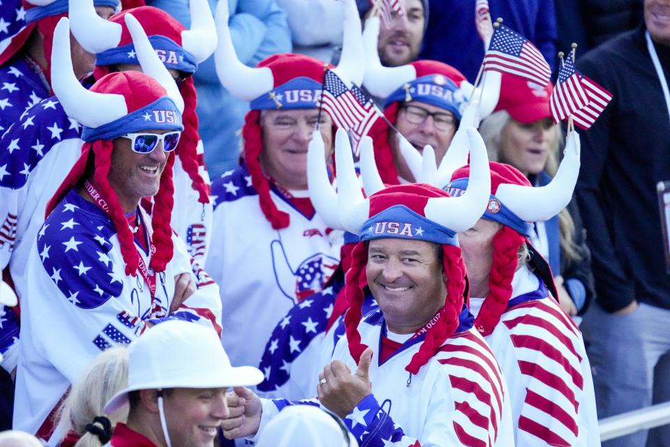 Fans wait on the first tee for the first group to tee off before a foursomes match the Ryder Cup at the Whistling Straits Golf Course Saturday, Sept. 25, 2021, in Sheboygan, Wis. (AP Photo/Ashley Landis)