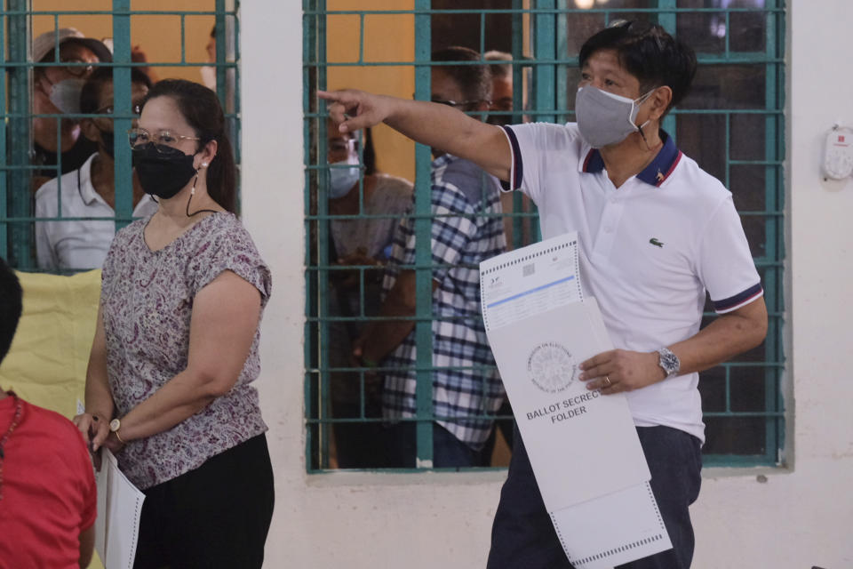 Presidential candidate Ferdinand Marcos Jr., the son of the late dictator, votes at a polling center in Batac City, Ilocos Norte, northern Philippines on Monday, May 9, 2022. Filipinos were voting for a new president Monday, with the son of an ousted dictator and a champion of reforms and human rights as top contenders in a tenuous moment in a deeply divided Asian democracy. (AP Photo)