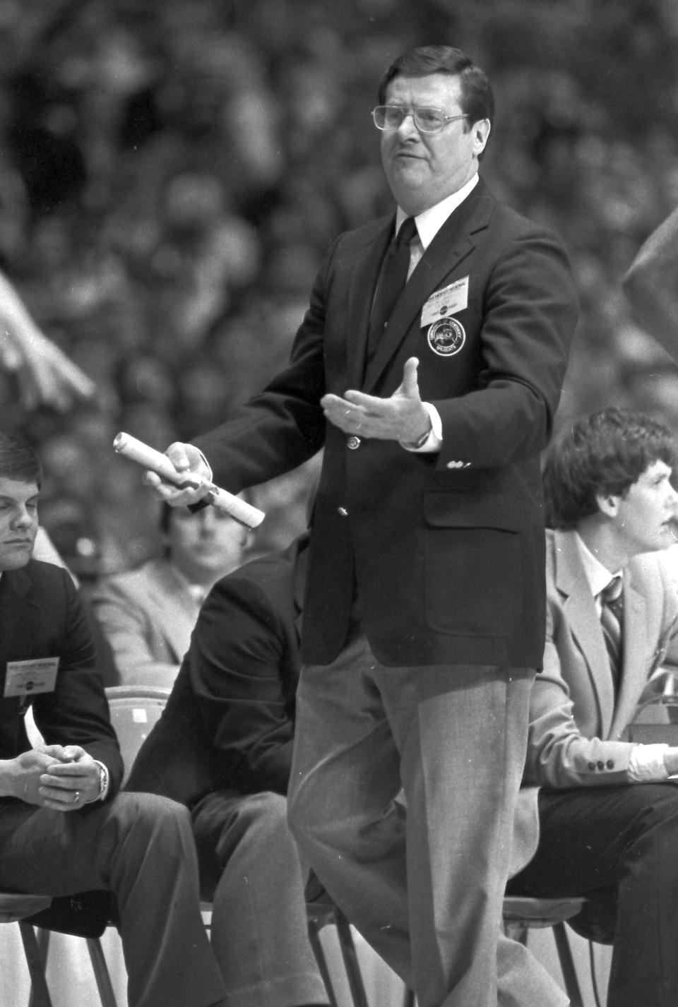FILE - This undated file photo shows Kentucky basketball coach Joe B. Hall on the sidelines. The former Kentucky basketball coach has died at age 93. The program announced Hall’s death in a social media post Saturday, Jan. 15, 2022 after the coach’s family notified current Wildcats coach John Calipari.(AP Photo/File)