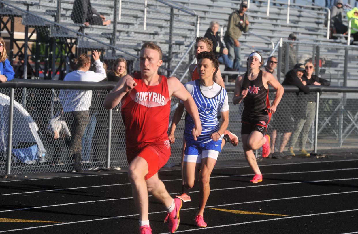 Bucyrus' Eli Sprague races in the 400-meter dash at the Northern 10 track championships.