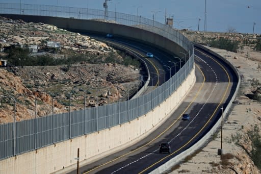 Cars drive along Route 4370 near Jerusalem on January 10, 2019