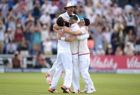 England's Moeen Ali, Stuart Broad, James Anderson and Mark Wood celebrate winning the first test Reuters / Philip Brown Livepic