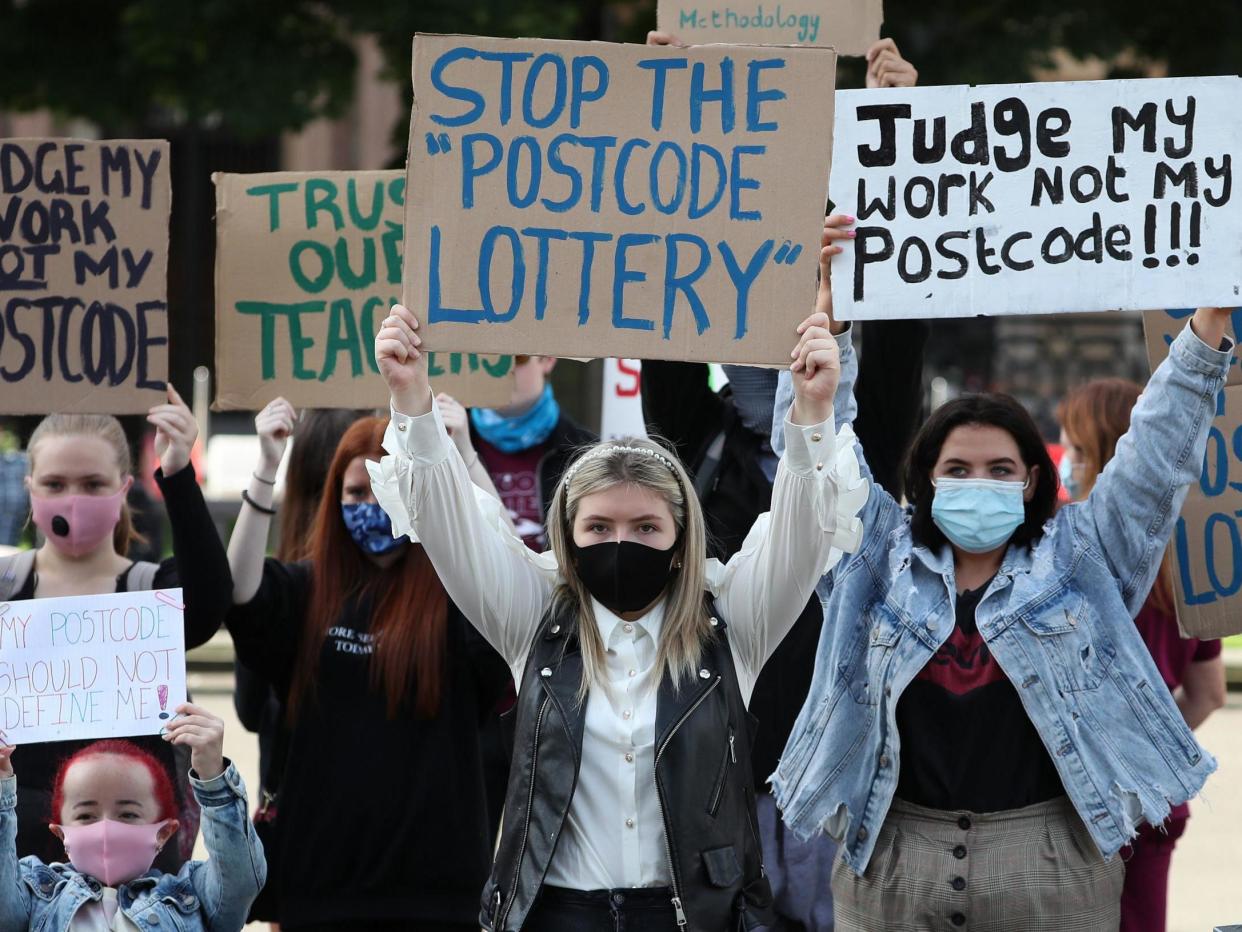 Erin Bleakley (centre) joins protesters in George Square in Glasgow to protest against the Scottish Qualifications Authority (SQA) method of producing exam results this year: Andrew Milligan/PA Wire