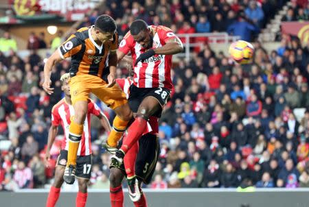 Britain Football Soccer - Sunderland v Hull City - Premier League - The Stadium of Light - 19/11/16 Sunderland's Victor Anichebe in action with Hull City's Curtis Davies Reuters / Scott Heppell Livepic