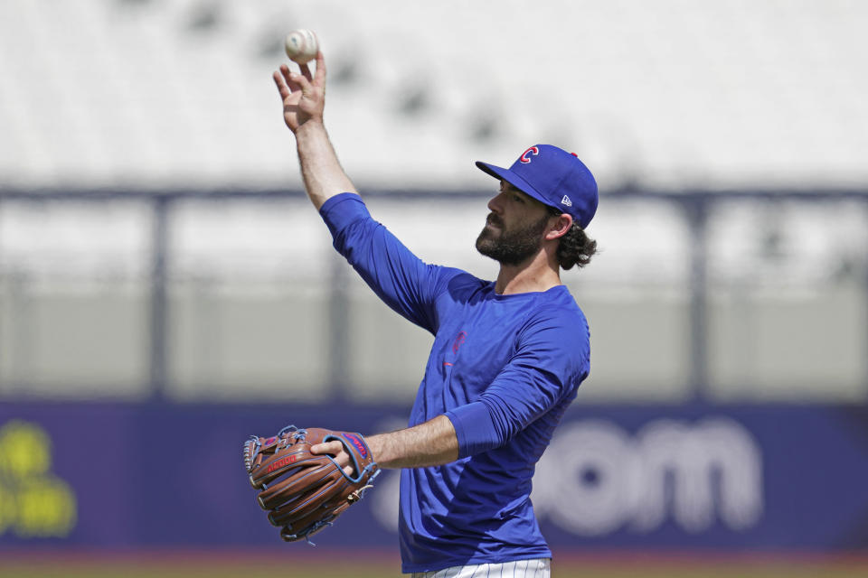 Chicago Cubs' Dansby Swanson practices during a training session ahead of the baseball match against St. Louis Cardinals at the MLB World Tour London Series, in London Stadium. (AP Photo/Kin Cheung)