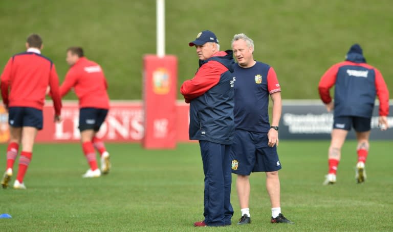 The British and Irish Lions' coach Warren Gatland (C) watches his team practise, in Wellington, on June 26, 2017