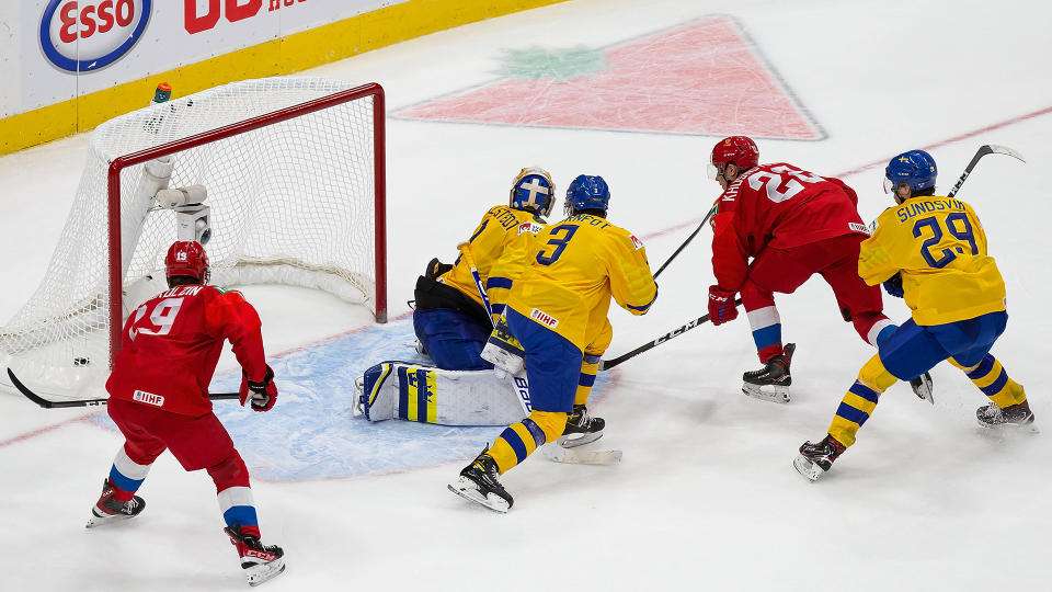 Marat Khusnutdinov of Russia scores the game-winning goal against goaltender Jesper Wallstedt of Sweden at the world juniors. (Photo by Codie McLachlan/Getty Images)