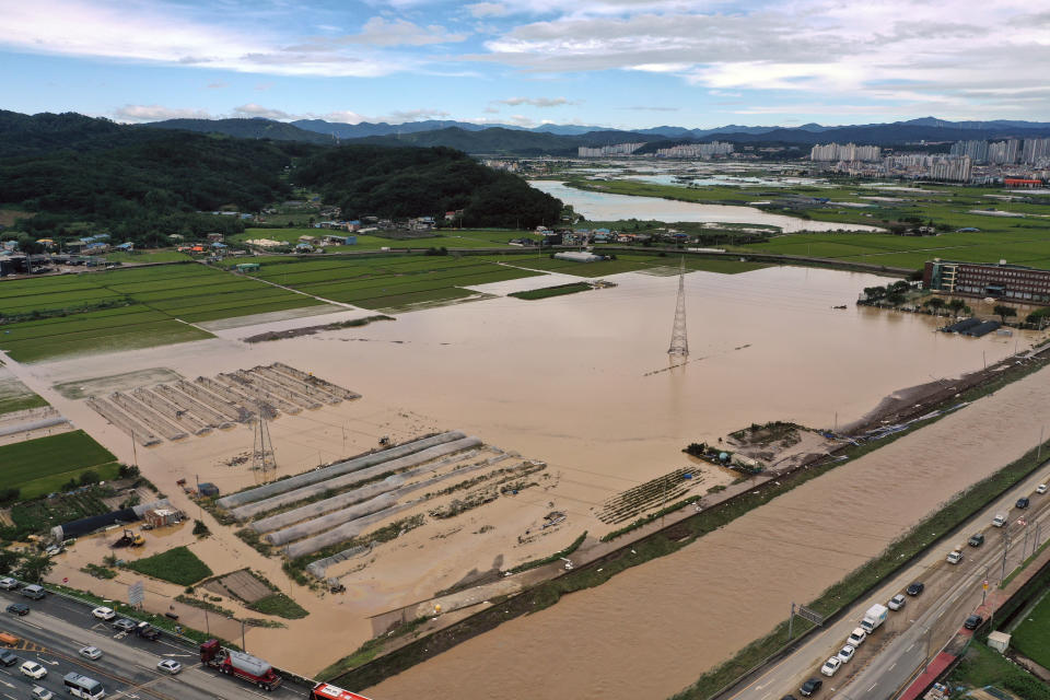 Farmland is flooded in the aftermath of Typhoon Hinnamnor at a village in Pohang, South Korea, Tuesday, Sept. 6, 2022. The most powerful typhoon to hit South Korea in years battered its southern region Tuesday, dumping a meter (3 feet) of rain, destroying roads and felling power lines, leaving tens of thousands of homes without electricity before weakening at sea. (Kim Hyun-tae/Yonhap via AP)