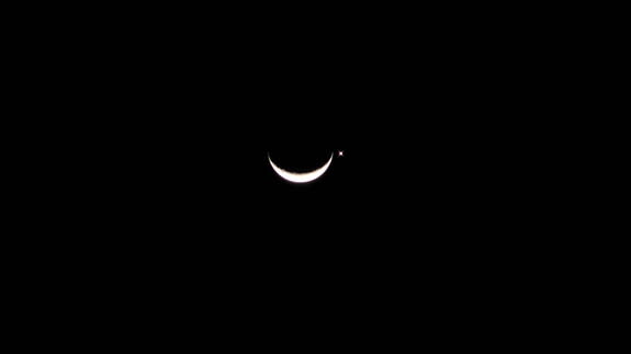 Paulo Crozariol sent SPACE.com this image of the moon and Venus over Taubate, Brazil on Sept. 8. “It was an amazing show,” Crozariol wrote SPACE.com in an email. He used a Panasonic HDC – TM 900 camera to take the photo.