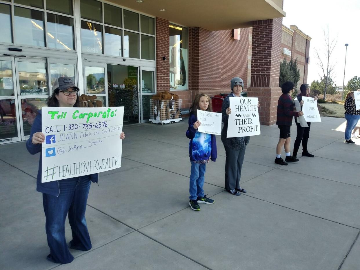 Workers and supporters outside a JoAnn's Fabrics and Crafts store in Colorado Springs last week. Jessica DeFronzo is third from the left. (Photo: Courtesy Jessica DeFronzo)