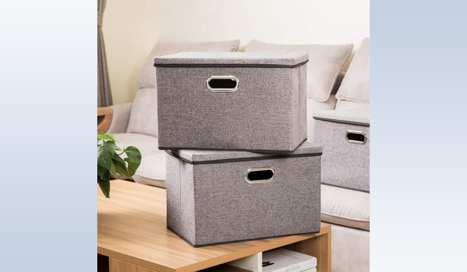 collapsible storage boxes sitting on a table