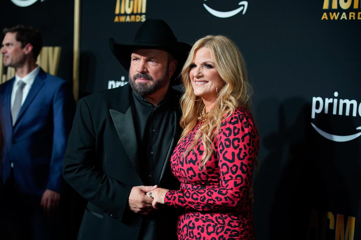 \Garth Brooks and Trisha Yearwood arrive for the 58th ACM Awards at the Ford Center at the Star in Frisco Texas, on Thursday, May 11, 2023.