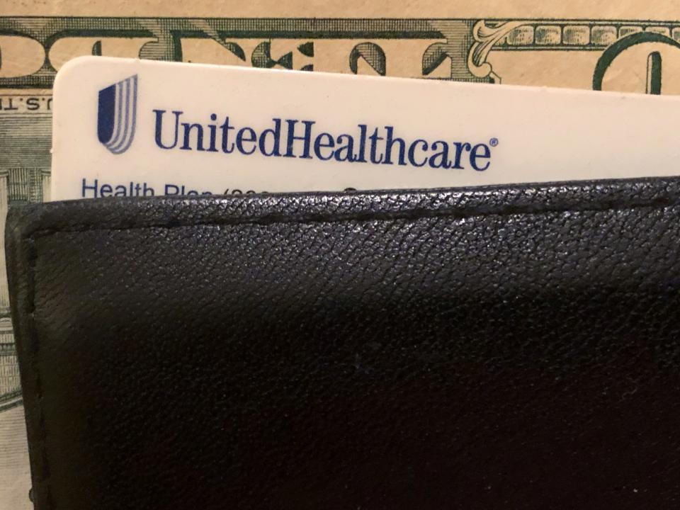 A UnitedHealth Group health insurance card is seen in a wallet in this picture illustration October 14, 2019. REUTERS/Lucy Nicholson/Illustration