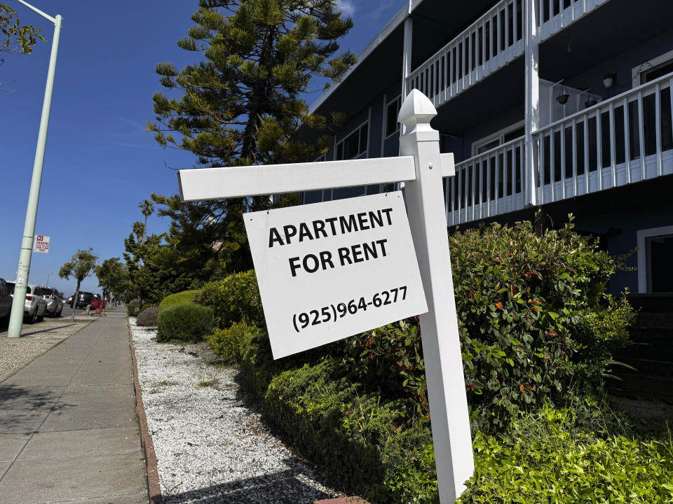 A sign sits outside an apartment building in Alameda, Calif. on Tuesday, April 16, 2024. A bill in California wants to make more rental housing available to tenants with pets. (AP Photo/Terry Chea)
