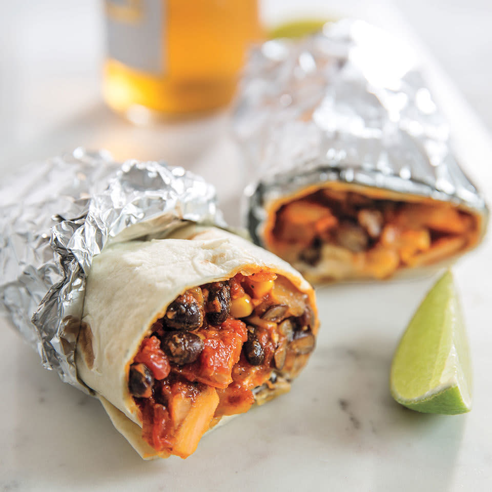 <p>This vegetarian bean burrito recipe is perfect any time of day, from breakfast (add a scrambled egg) to a late-night snack. It's also ideal for days when you need an energy boost to get through a draining event like a soccer tournament or a marathon meeting. Bonus: You can wrap it in foil and eat it on the go. Excerpted from The Dinner Plan by Kathy Brennan and Caroline Campion, published by ABRAMS © 2017.</p> <p> <a href="https://www.eatingwell.com/recipe/261899/kitchen-sink-burritos/" rel="nofollow noopener" target="_blank" data-ylk="slk:View Recipe;elm:context_link;itc:0;sec:content-canvas" class="link ">View Recipe</a></p>