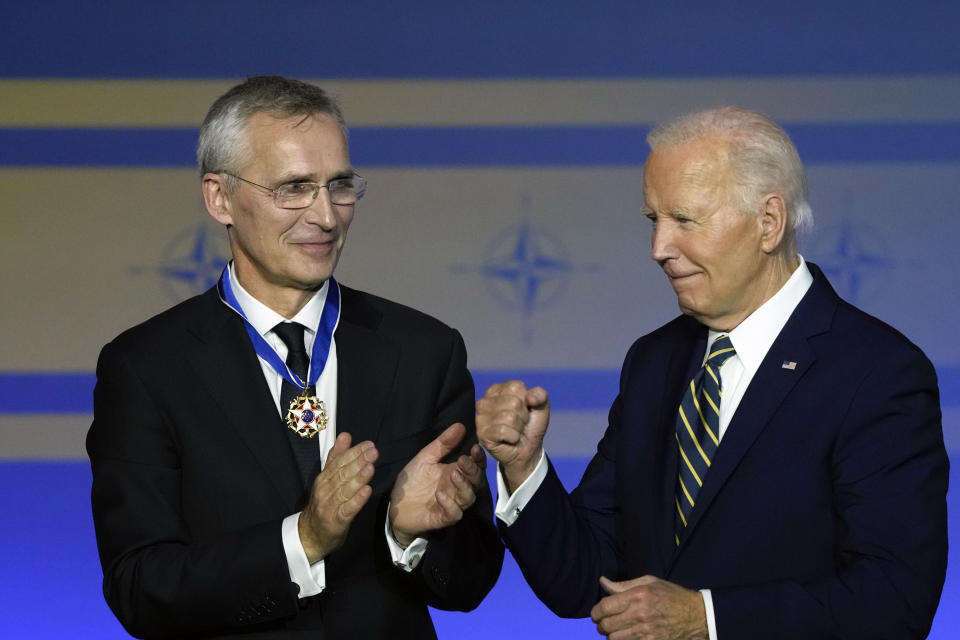 President Joe Biden, right, presents NATO Secretary General Jens Stoltenberg with the Presidential Medal of Freedom on the 75th anniversary of NATO at the Andrew W. Mellon Auditorium, Tuesday, July 9, 2024, in Washington(AP Photo/Susan Walsh)
